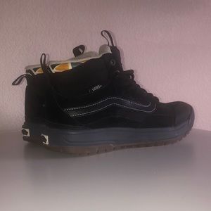 Vans UltraRange Hannah Scott black all weather high tops.